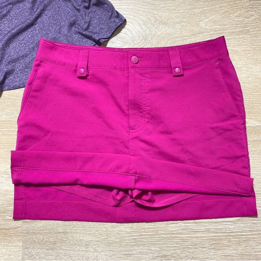 Under Armour Bright Pink Skort Skirt. Golf or tennis skirt with shorts size 8